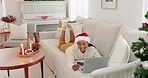 Christmas, online shopping and laptop with a black woman customer using her credit card to make an internet payment from home. Computer, ecommerce and retail with a young female in the holiday season