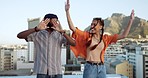 African friends, dance and love smile laughing fun together on city building rooftop. Black American man, happy trendy woman and couple bonding or friendship spiritual freedom dance in urban town