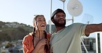 Couple, bonding or talking on city rooftop and pointing, sightseeing Portugal or enjoying summer holiday vacation view. Smile, happy and love black man and interracial fashion woman on location date