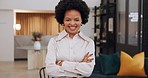 Happy, smile and portrait of a black woman in the office standing with crossed arms in the lobby. Happiness, success and African business manager with a positive vision or mindset in the workplace.