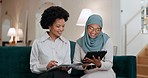 Diversity employees, tablet and business women planning data, research or strategy collaboration in startup office lounge. Black woman, muslim worker and global teamwork, project management and ideas