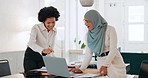 Laptop, teamwork and meeting with a muslim business woman and african colleague at work together in the office. Marketing, computer and report with a female employee team working in collaboration