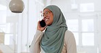 Business phone call or communication and muslim woman in conversation on smartphone in office, networking with people on tech and talk about startup or creative islamic entrepreneur smile on mobile