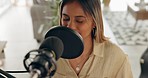 Music, sing and podcast with a woman artist singing into a microphone in a live broadcast while streaming or recording. Influencer, singer and studio with a female musician performing for radio 