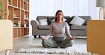 Woman, zen and meditation on carpet in living room at home. Mental health wellness, balance peace and relax healthy motivation mind training exercise or yoga energy chakra spiritual freedom on floor