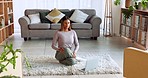 Exercise, laptop and woman doing meditation in her living room for calm mind and body wellness. Yoga, spiritual and girl from Mexico meditating with a online video on a computer in her lounge at home