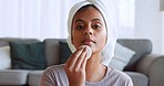 Cosmetics, skincare and black woman with cotton pad for organic facial, face cleaning and natural beauty at home. Makeup, African American girl and moisturize skin for body care, smooth and glow skin