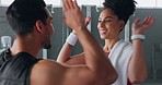 High five woman, personal trainer man for fitness goal in gym or training facility together. Success, black woman motivation or friends at wellness workout, exercise support or partnership for health