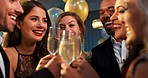 Young diverse happy friend group laughing holding glasses toasting at party