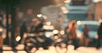 Blurred crowd of people walking over a pedestrian crossing