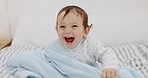 Baby, happy and blanket for peekaboo, game and play on bed in room while laugh, comic and happiness in house. Young infant child, cover hide and seek with smile, funny and  comedy in home bedroom