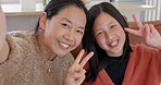 Selfie, smartphone and mother with child on sofa for social media app, parents video blog and china family holiday bonding. Happy woman mom with girl kid in portrait photography or global video call