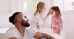 Father, girl kids and face mask in bathroom in for comic bonding, smile and happy together for skincare. Happy, dad and daughter children with cream, facial and beauty for skin with funny happiness