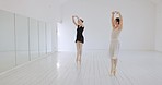 Ballet dancers, training and elegant for performance, entertainment gig and in dance studio. Young women, artist and doing ballet routine to practice for show, dedicated and concentration for dancing