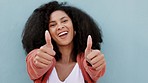 Thumbs up, smile and happy black woman standing on a blue studio background mockup. Hands, like gesture or approval, satisfaction or okay, encouragement or welcome, thumb signal or yes thank you sign