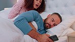 Nosy, bed and woman reading phone communication of a man before bed time together. Sneaky, social media and couple in the bedroom typing on a mobile, jealous of conversation and surprise on tech