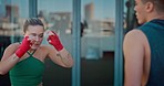 Gym, fitness and woman kickboxing with personal trainer, focus and motivation for health, training and self defense. Workout, exercise and wellness, strong girl kick boxer kicking man at city studio.