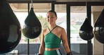 Woman, boxer and portrait smile for fitness, exercise or training workout ready for a fight at the gym. Female professional boxing fighter in competitive sports smiling in preparation for ring match