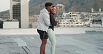 Hug, fitness and couple training on a rooftop with motivation, running and comic together in city of Turkey. Comedy, happy and playful man and woman with affection doing outdoor workout and exercise