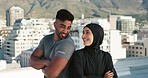 Fitness, muslim couple and exercise on city building rooftop for workout, training and motivation for healthy lifestyle. Islamic man and woman with hijab outdoor for personal trainer session