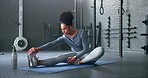 Black woman, gym and stretching, fitness and exercise motivation and body training for sport and health. Healthy, wellness and preparing for workout, warm up and stretch for active lifestyle.