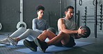 Fitness, energy and friends on gym floor with weight ball for training, power and exercise together. Cross, workout and black woman with man for sports, power and cardio in strength, core and mindset