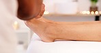 Feet, acupuncture and therapy with a woman in a spa for wellness or to relax on a massage bed. Physiotherapy, medical and health with a female customer in a center for stress relief or treatment