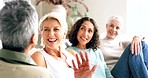 Happy mature women in group on sofa, laughing at joke and talk in living room together. Happiness, smile and friendship in retirement, girl friends having fun conversation and relax on crazy weekend.