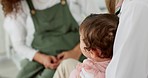 Baby, crying and scared at doctor for healthcare appointment at pediatrician for health check and update. Mother, child and medical professional at infant care consultation holding unhappy patient.

