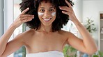 Face mask, cream and black woman happy about skincare beauty, wellness and facial. Portrait of a woman with a smile in a bathroom or spa busy with healthy, dermatology and cosmetic eye lotion