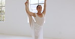 Ballet, stretch and woman dancer in studio for flexibility, training and performance practice. Fitness, theatre and stretching by artist prepare body for physical, dancing and rehearsal with mock up