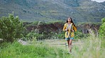 Freedom, fitness and hiking by woman in nature, walking and relax with peace, zen and morning cardio. Forest, girl and hike in fresh air, workout and calm walk for mind, stress relief and exercise