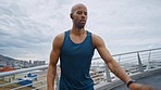 Black man stretching before run, runner and fitness with running in city and warm up for wellness and health, outdoor training. Athlete focus with earphones for music, exercise and cardio exercise.