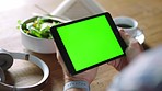 Green screen, tablet and hands of a business person with coffee, marketing space and digital branding on tech. Advertising website, company logo and employee with lunch and tech for a mobile app