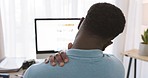 Black man, shoulder pain and stress working on pc for remote work, overworked freelance business or frustrated entrepreneur in home office. African person, burnout and arm injury sitting at computer