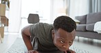 Fitness, exercise and black man doing push up in home for wellness, strong muscles and healthy lifestyle. Sports, endurance and male exercising, do workout and bodybuilding training in living room