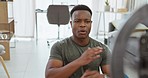 Black man, fitness coaching and broadcast in living room on social media, virtual wellness training and exercise motivation. Content creator, personal trainer and sports influencer talking in podcast