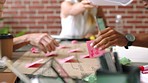 Hands, sticky notes and team brainstorming for group project, marketing strategy and planning for success. Teamwork, post it and coworkers writing, sales growth and startup company for data analysis.