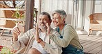 Mature couple, waving or phone video call on house, home or luxury resort patio for retirement vacation, holiday or break. Smile, happy or talking elderly man and Indian woman on technology zoom call