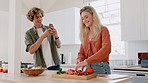 Couple, cooking woman with man and smartphone for live streaming, food blog and influencer cook on camera. Video recording with phone for social media live, vegetables and chef skill for vlog content