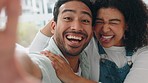 Couple, selfie and funny face in a loving, caring relationship while relax at home together. Loving, caring boyfriend and girlfriend taking silly photo at home while bonding in romantic relationship