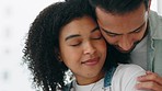 Love, romance and couple hugging with care, comfort and happiness in their home in Puerto Rico. Affection, sweet and young man and woman embracing for a romantic intimate moment together at home.