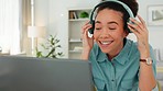 Video call, headphones and laptop of woman in home office working online, virtual communication and writing for website management career. Zoom call, technology and worker typing for a marketing job