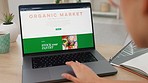 Organic market, food and online shopping on laptop at home for groceries. Winter recipes, ecommerce and woman scrolling for grocery products to restock on website, internet store or virtual shop.
