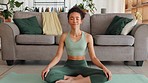 Yoga, meditation and happy woman on floor for home workout, exercise and training for mindfulness, health and wellness of body and mind. Calm female in lounge to meditate, pilates and zen breathing