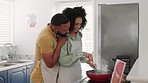 Love, cooking and black couple talking in kitchen while smelling aroma of delicious, gourmet and healthy meal. Romance, embrace and man and woman preparing food, having fun and enjoying time together