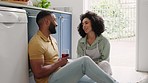 Black couple, love and communication with support and trust, strong relationship and relax at home. Talk, happy with black man and black woman, conversation and wine in kitchen, lifestyle and romance