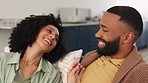 Black couple, talking and relax together on couch for love, quality time conversation and bonding in family home. African man, wife smile and happy conversation on couch in living room for support