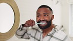 Black man, brushing teeth and mirror in bathroom, morning and focus for dental shine, health and wellness. Man, toothbrush and toothpaste for cleaning, healthy mouth and self care for hygiene in home