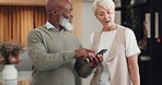 Mature business man and woman, phone and talking about audit collaboration for a tax report. Finance, teamwork and businessman and female ceo planning an online strategy with smartphone research